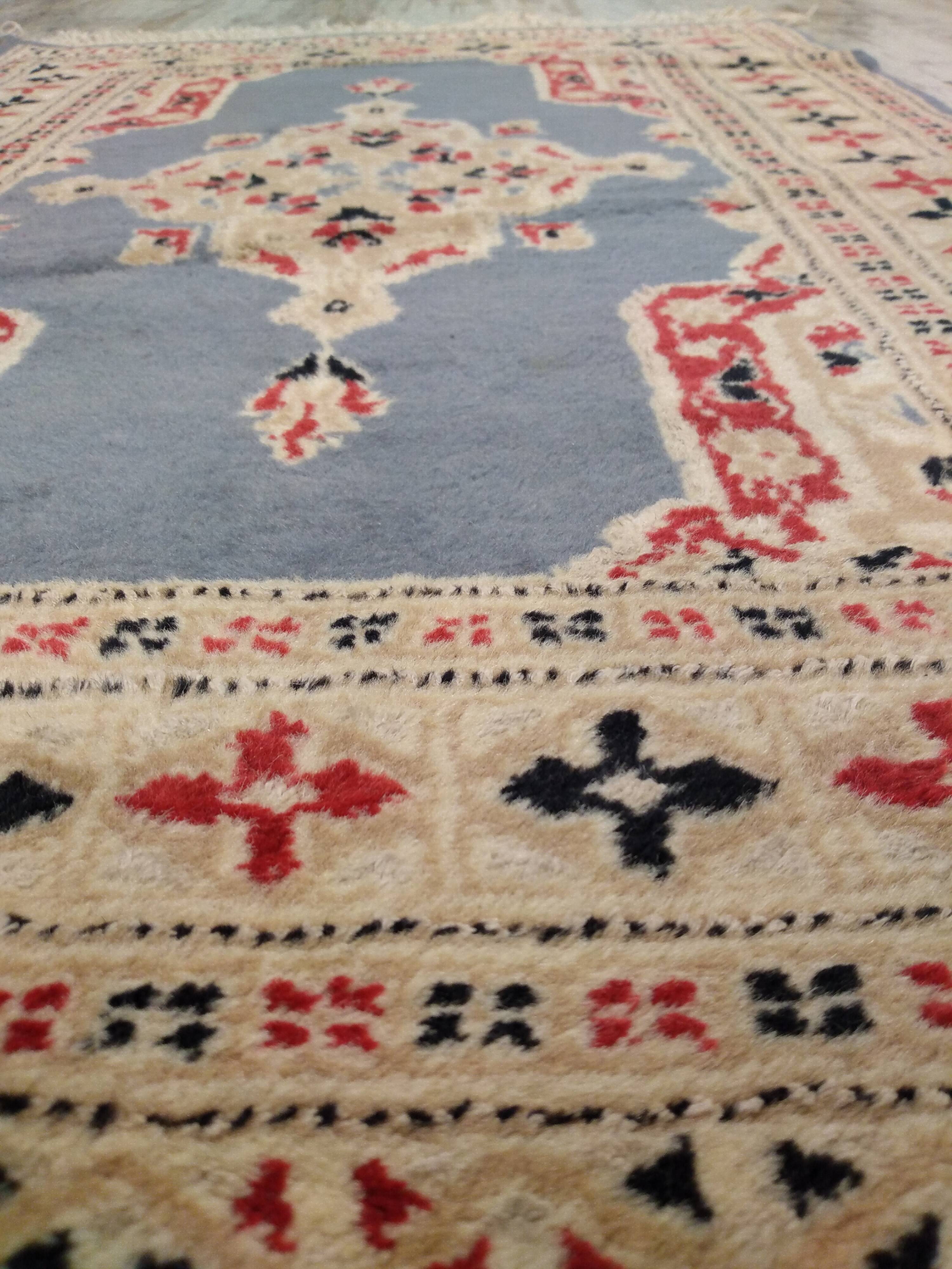 Handmade wool and silk Persian rug