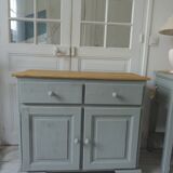 Compact buffet re-enchanted in grey-green, wooden top.
