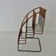 Raoul Guys rattan and metal magazine rack from the 50s