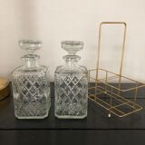 Pair of vintage decanters with brass basket