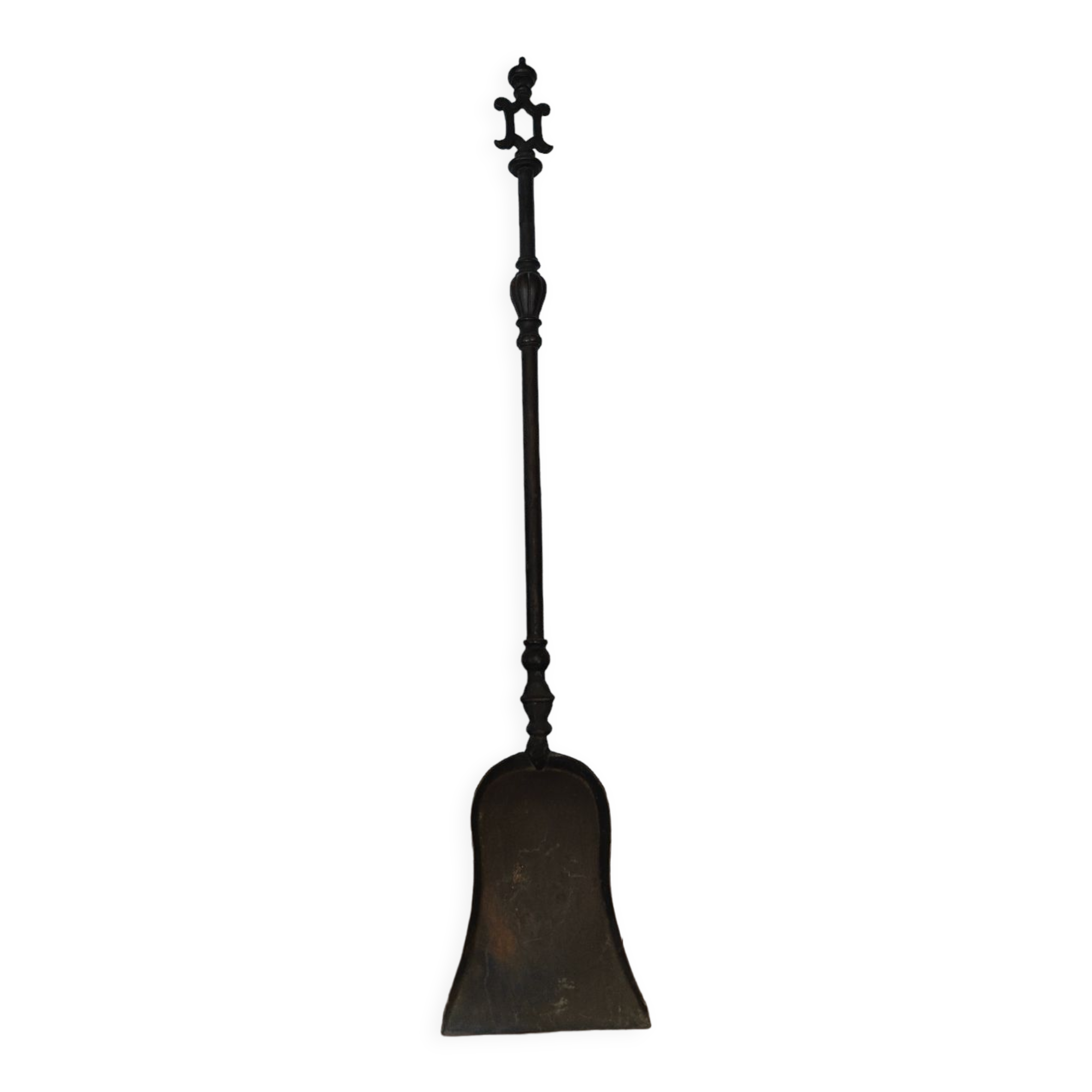 Cast iron carved fireplace shovel