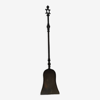 Cast iron carved fireplace shovel