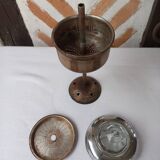 Silver metal coffee maker with glass cap