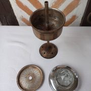 Silver metal coffee maker with glass cap