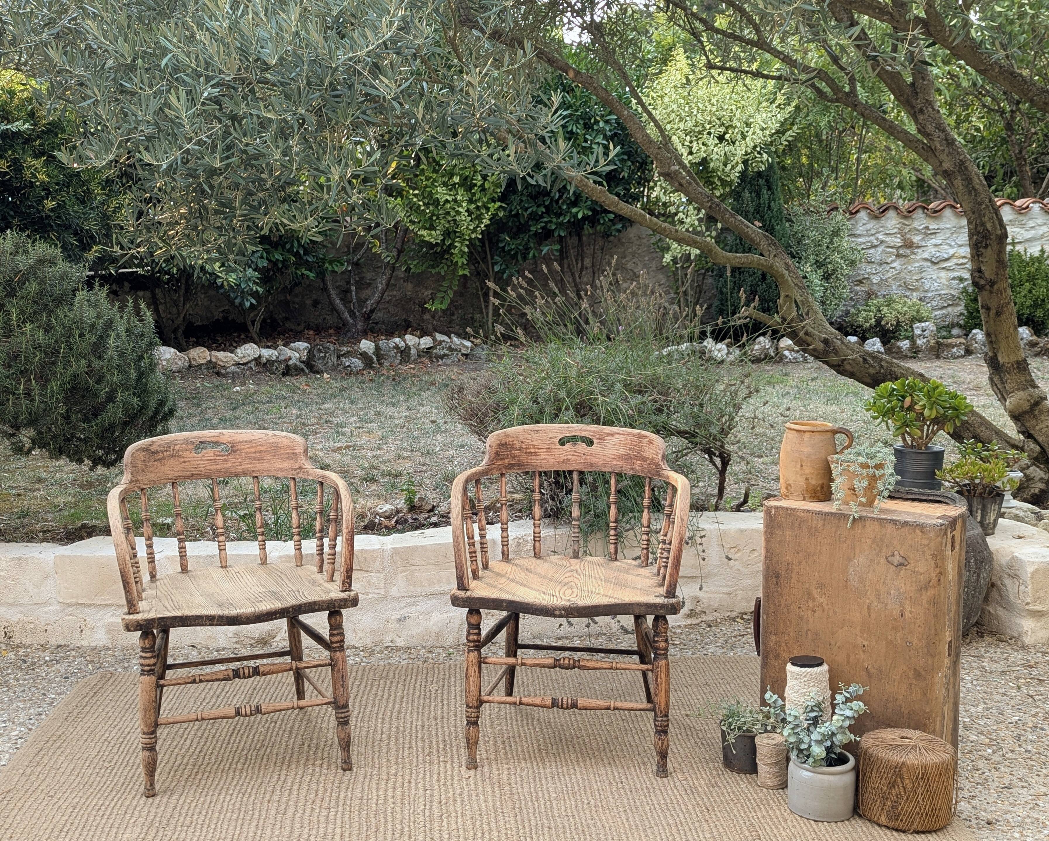 Pair of English captain's armchairs