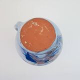 Large blue pitcher with abstract pattern