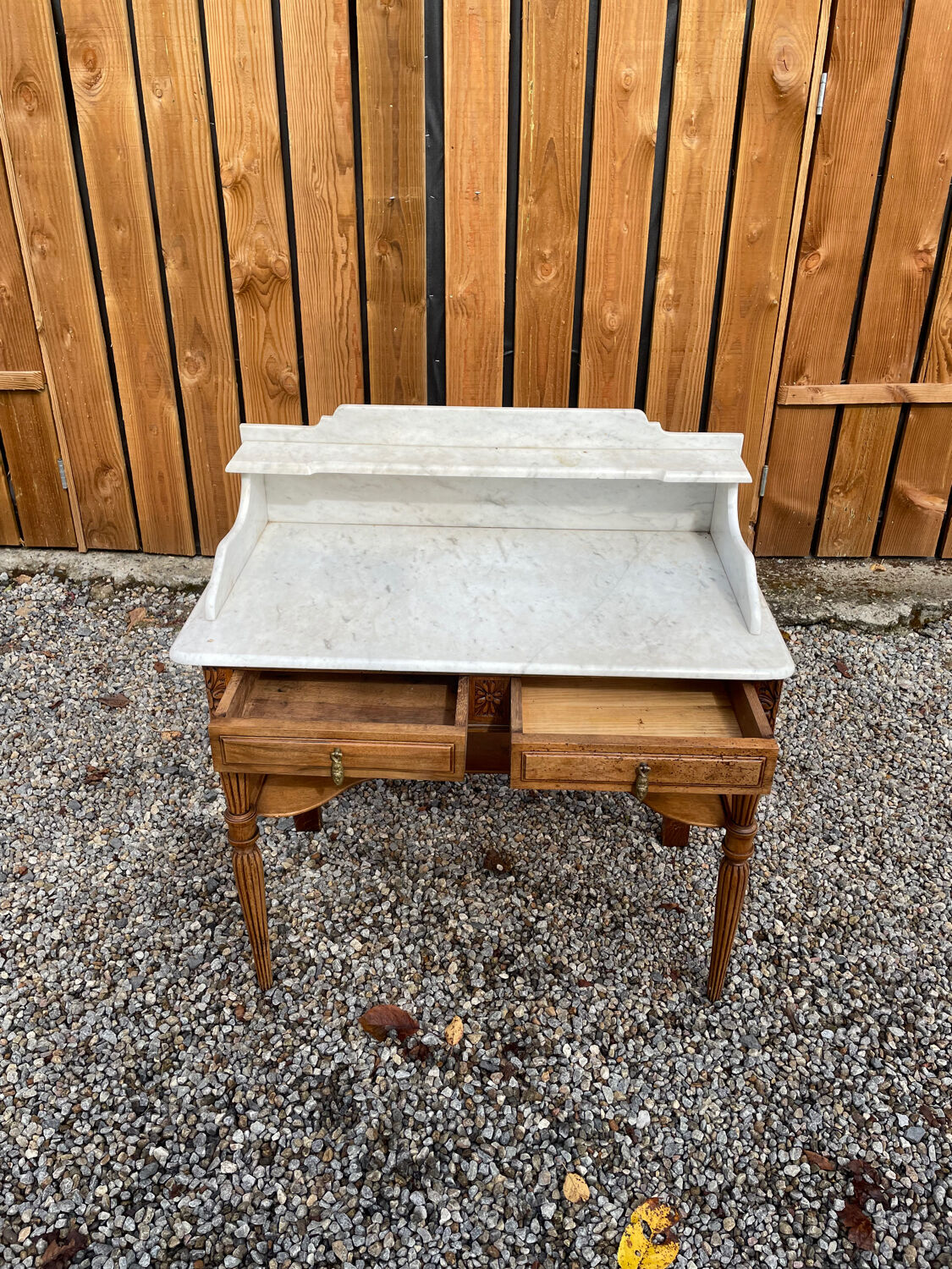 Wood and marble bathroom cabinet
