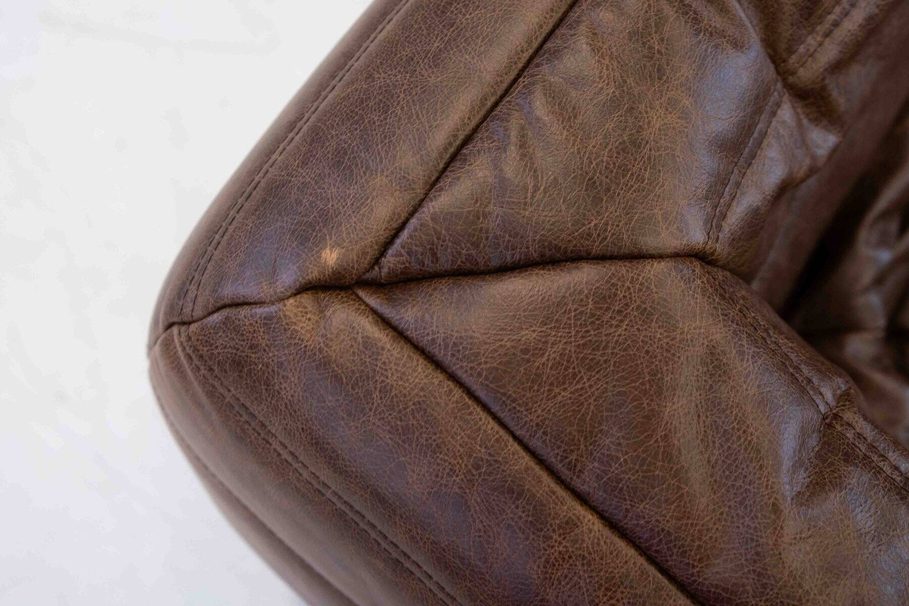 Vintage two-seater Togo sofa with arms in brown leather by Michel Ducaroy for Ligne Roset, 1970s