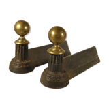 Pair of cast iron and brass chenets