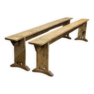 Pair of farmhouse table benches in poplar from the early 20th century.