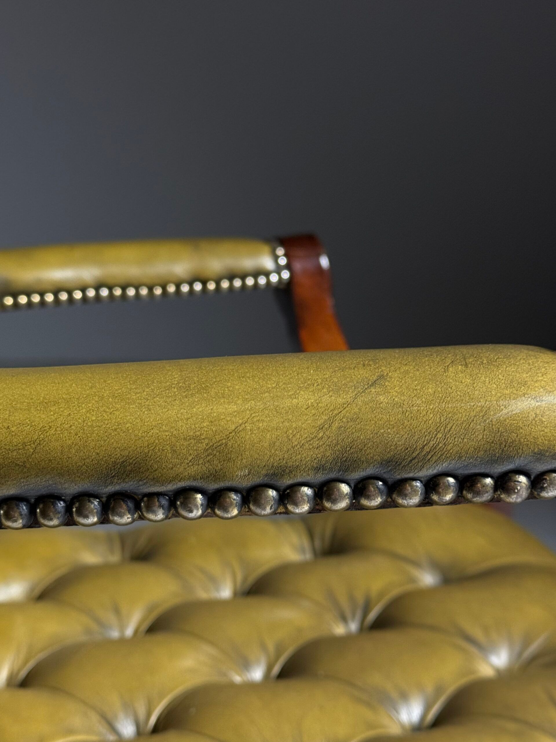 Green leather tufted office chair