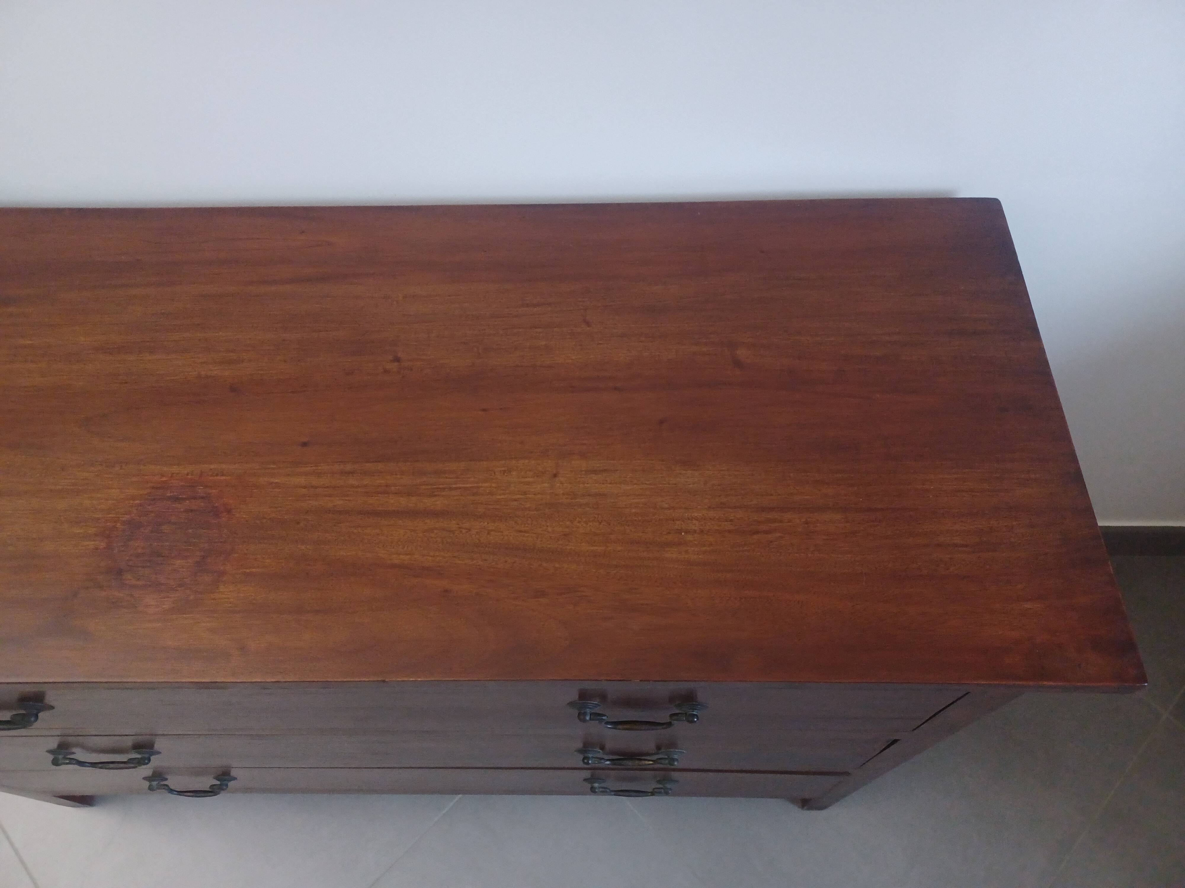 Three-drawer chest of drawers in exotic wood