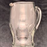 Patterned pitcher in worked glass