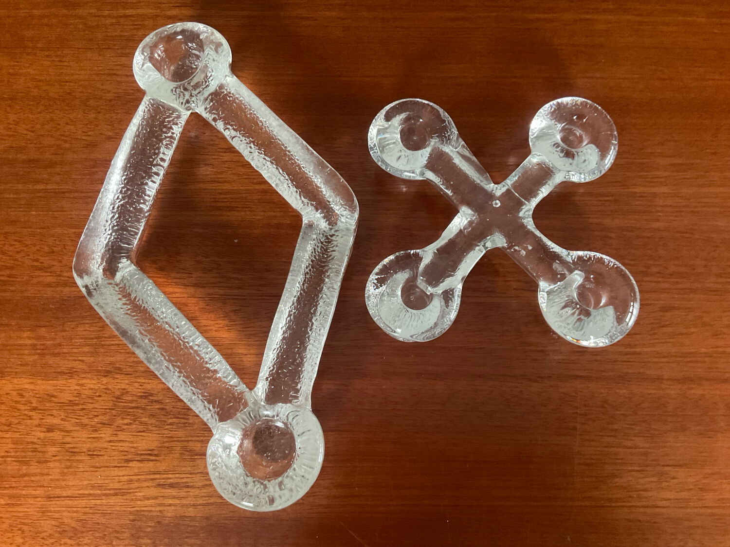 A pair of vintage moulded glass candlesticks.