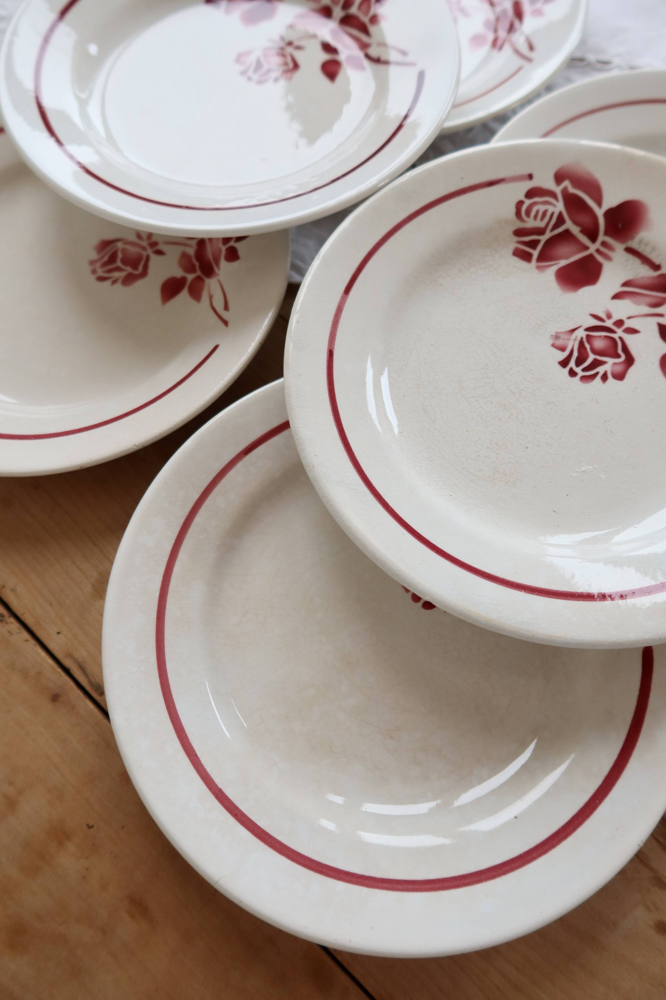6 vintage dessert plates Moulin des Loups with burgundy floral decoration.