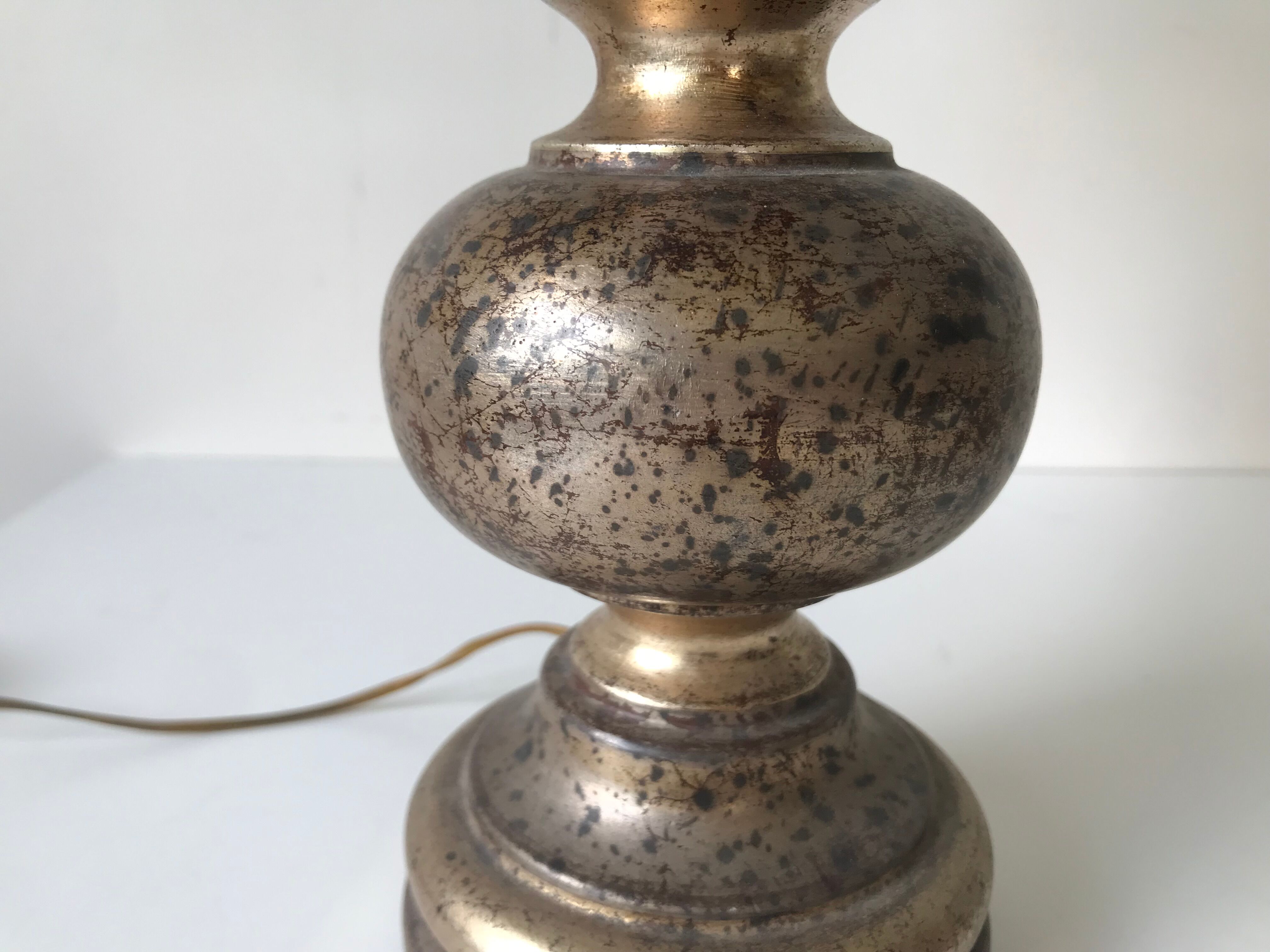 Paire de lampes florentines en bois doré, vers 1950.
