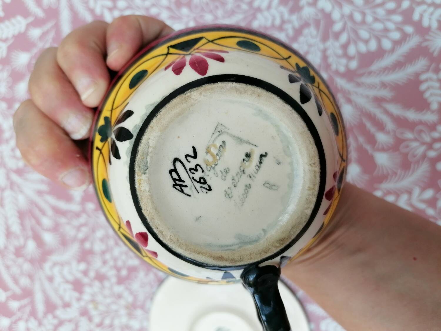 Hand-painted Breton earthenware cup and saucer from St Jean de Bretagne