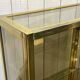 Pair of display cases in gilded chrome and smoked glass - 1980s