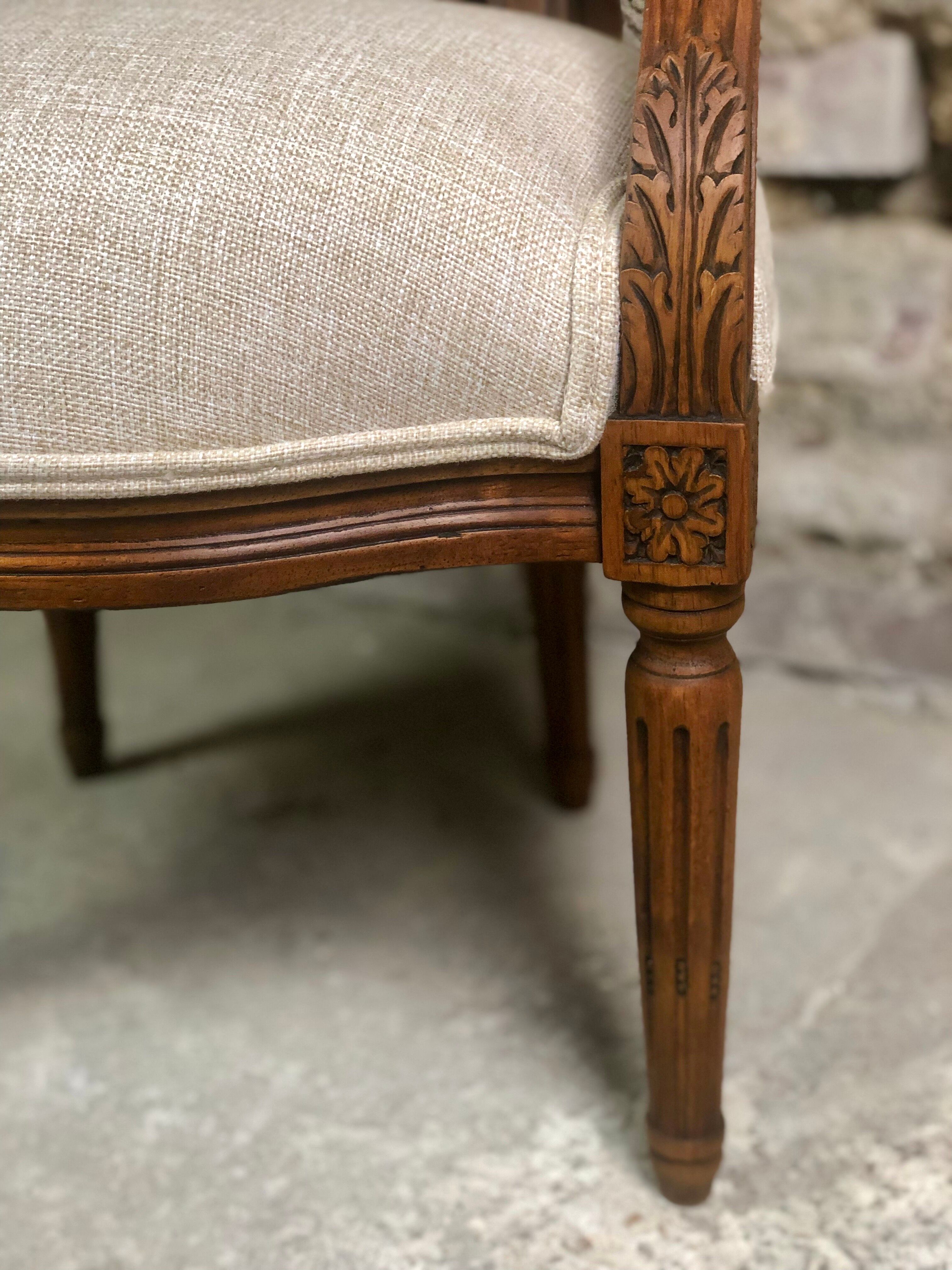 Louis XVI style children's armchair in carved walnut and beige antique upholstery