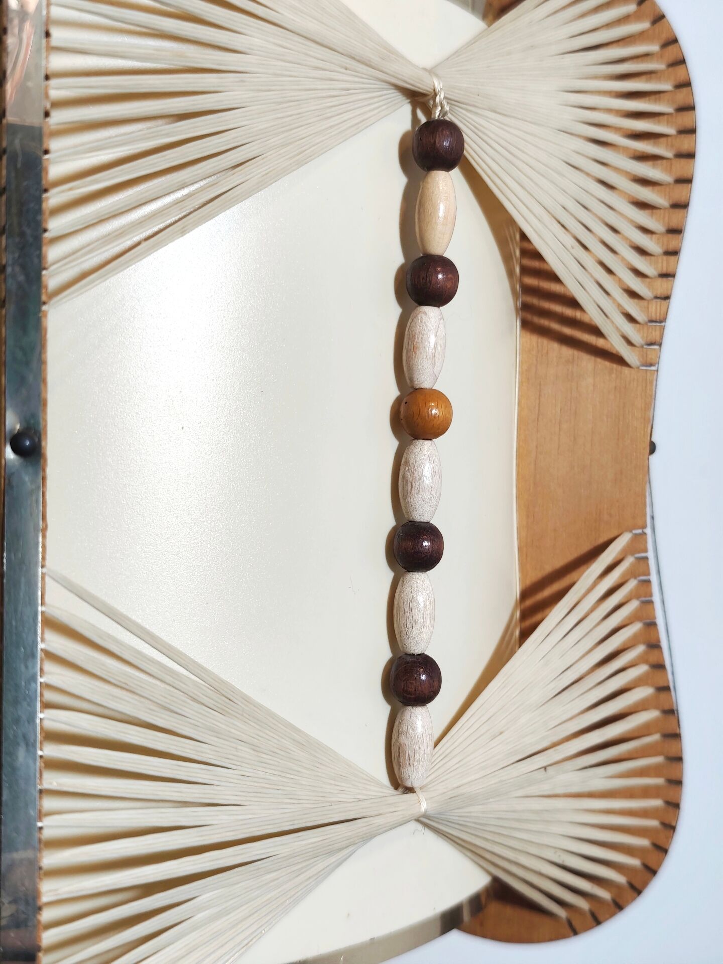 Raffia and wood ceiling lamp. Spain, 1970s.