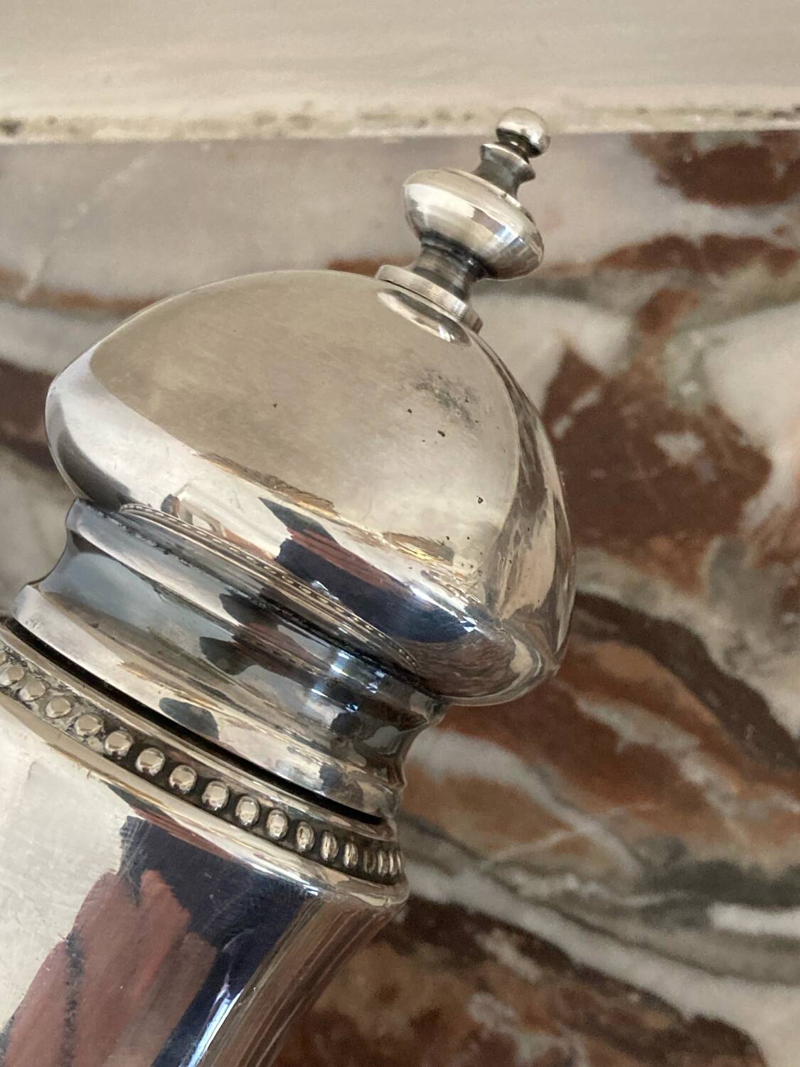 Silver metal pepper mill