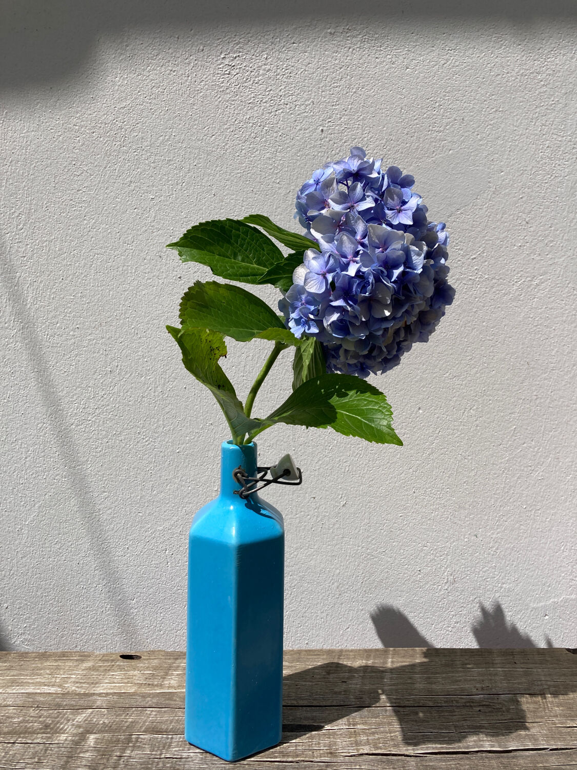 Glazed stoneware bottle signed turquoise blue