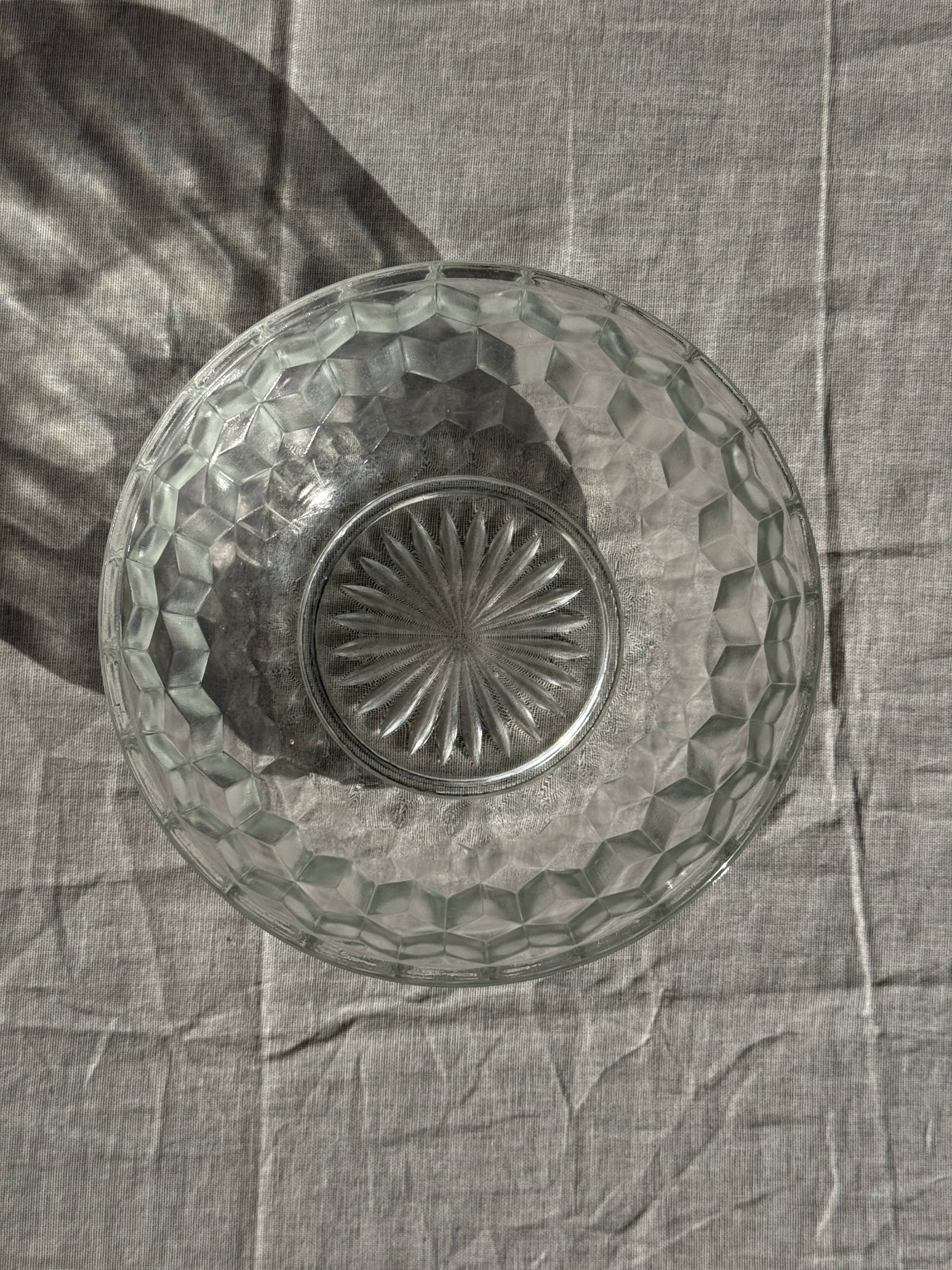 Small vintage glass bowl with a cube pattern.
