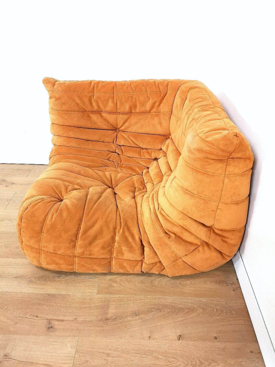 Togo corner armchair in "peach skin" by Michel Ducaroy for Ligne Roset