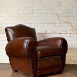 French leather club chair, chapeau de gendarme model, circa 1940