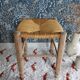 French wooden stool and vintage straw