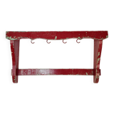 Wall shelf in garnet red wood