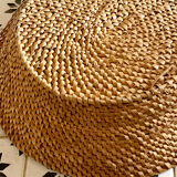 Basket in braided wicker and rattan