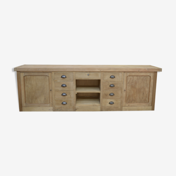 Sideboard in a row with 2 doors and 9 oak drawers