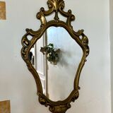 Large golden baroque style mirror