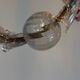Venetian Rezzonico chandelier in colourless and red Murano glass, circa 1900.
