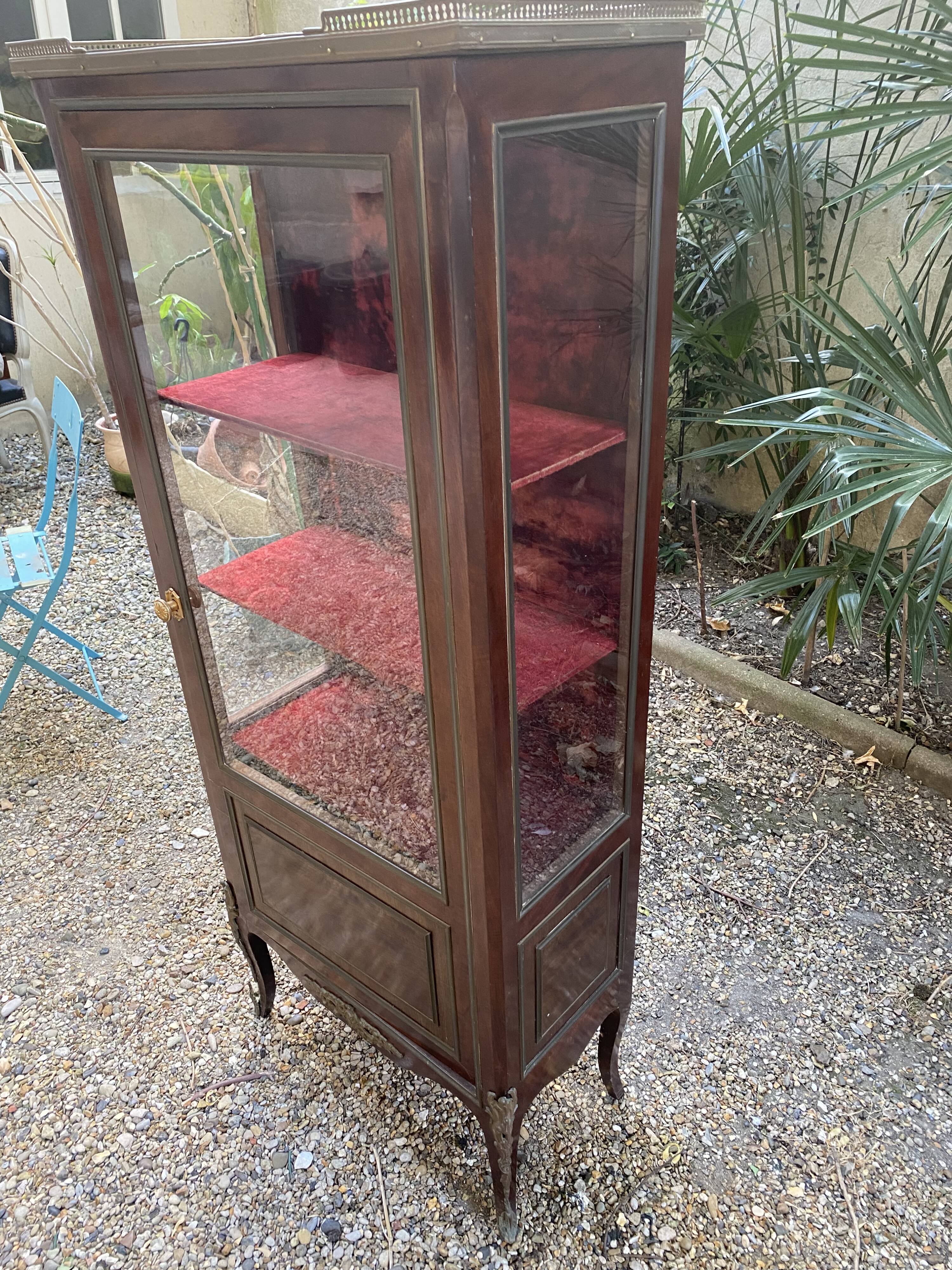 19th/20th century mahogany display cabinet, marble top and glass sides.