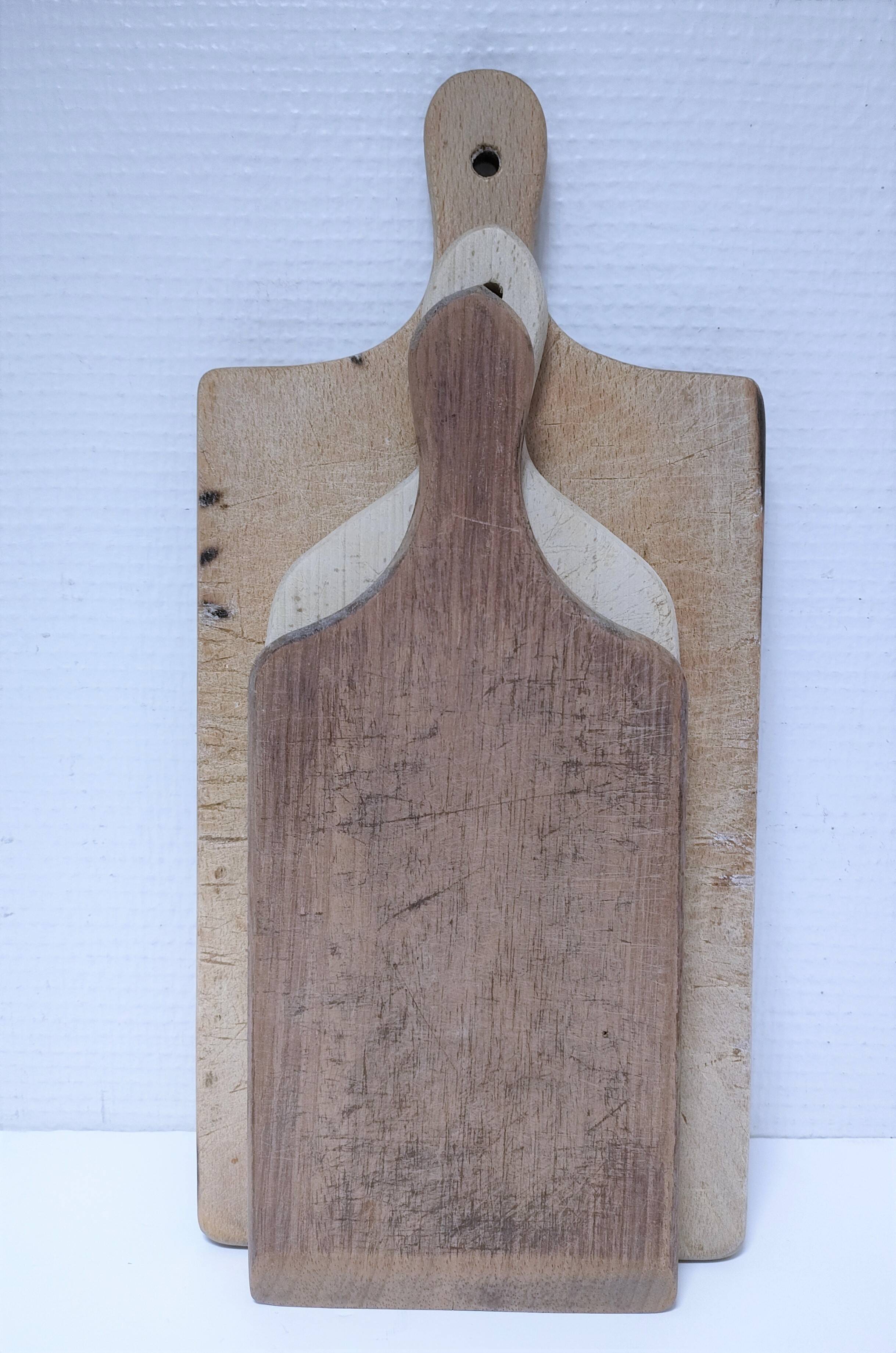 Three vintage solid wood cutting boards