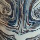 Handcrafted ceramic mug with marbled design, unique piece.