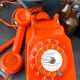 Orange vintage dial phone