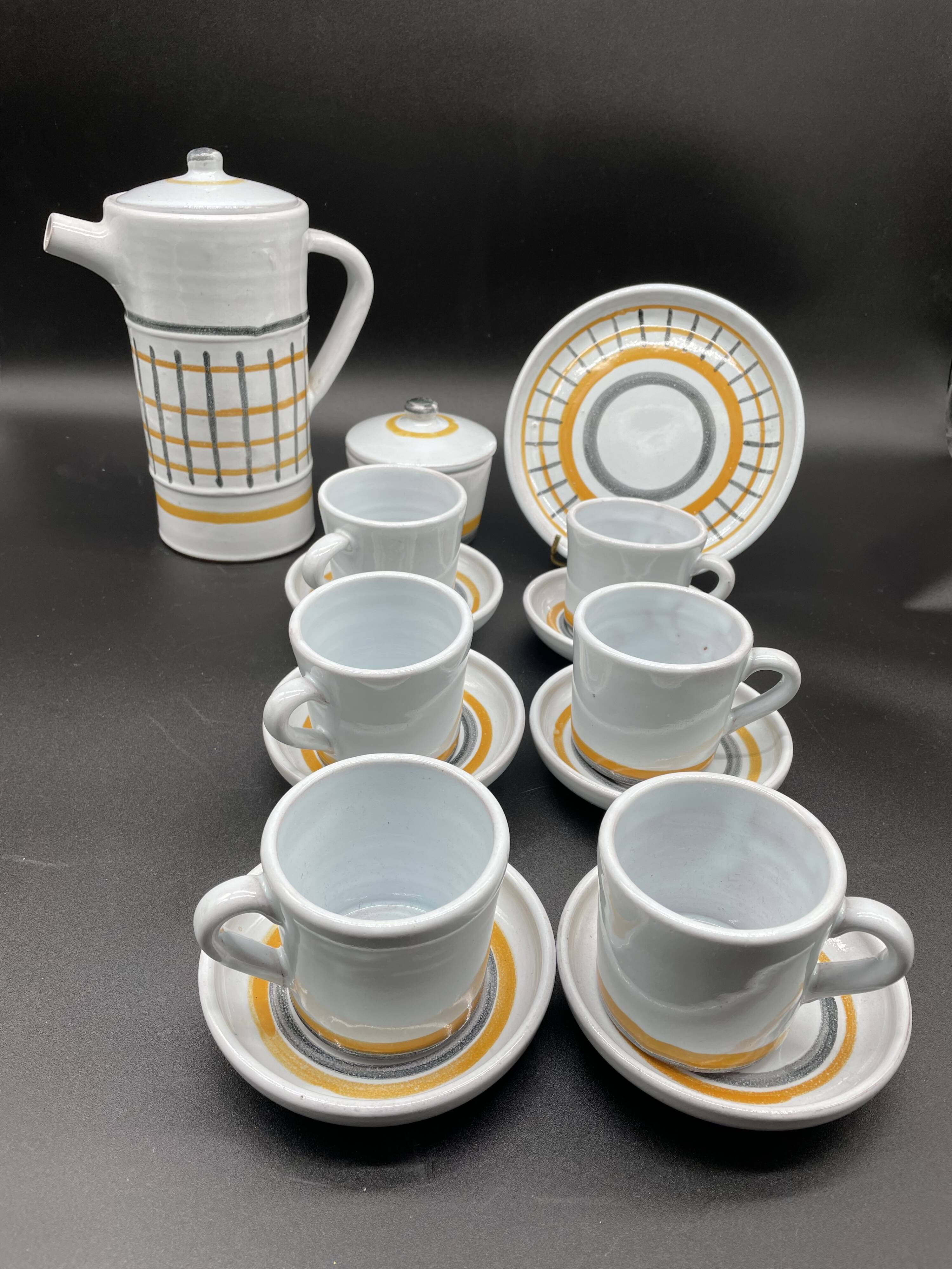 Vintage 1960s coffee service in ceramic, modernist design.