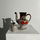Vintage stoneware teapot with flower and fruit patterns