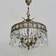 Old chandelier in bronze or silver brass, 4 lights, crystal grapevines. Year 60 70