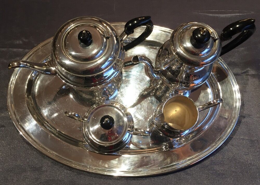 Coffee and the service in silver metal flagship