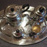 Coffee and the service in silver metal flagship