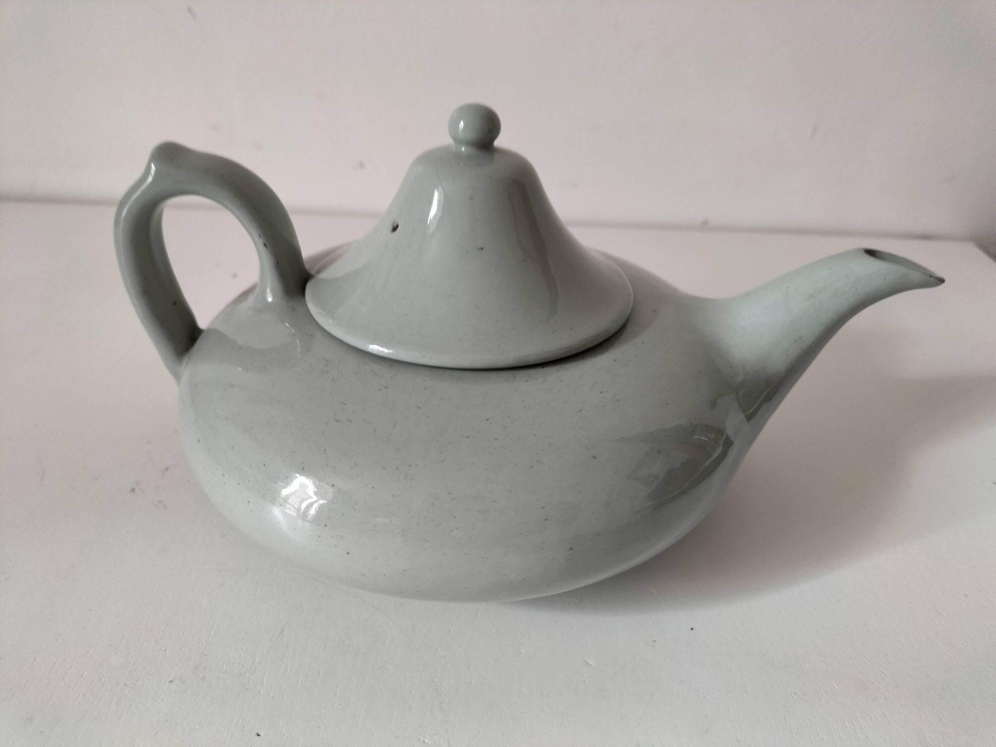 Celadon speckled glazed ceramic teapot