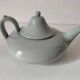 Celadon speckled glazed ceramic teapot