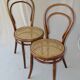 Two Turpe canned Bistro 1900 color rosewood chairs