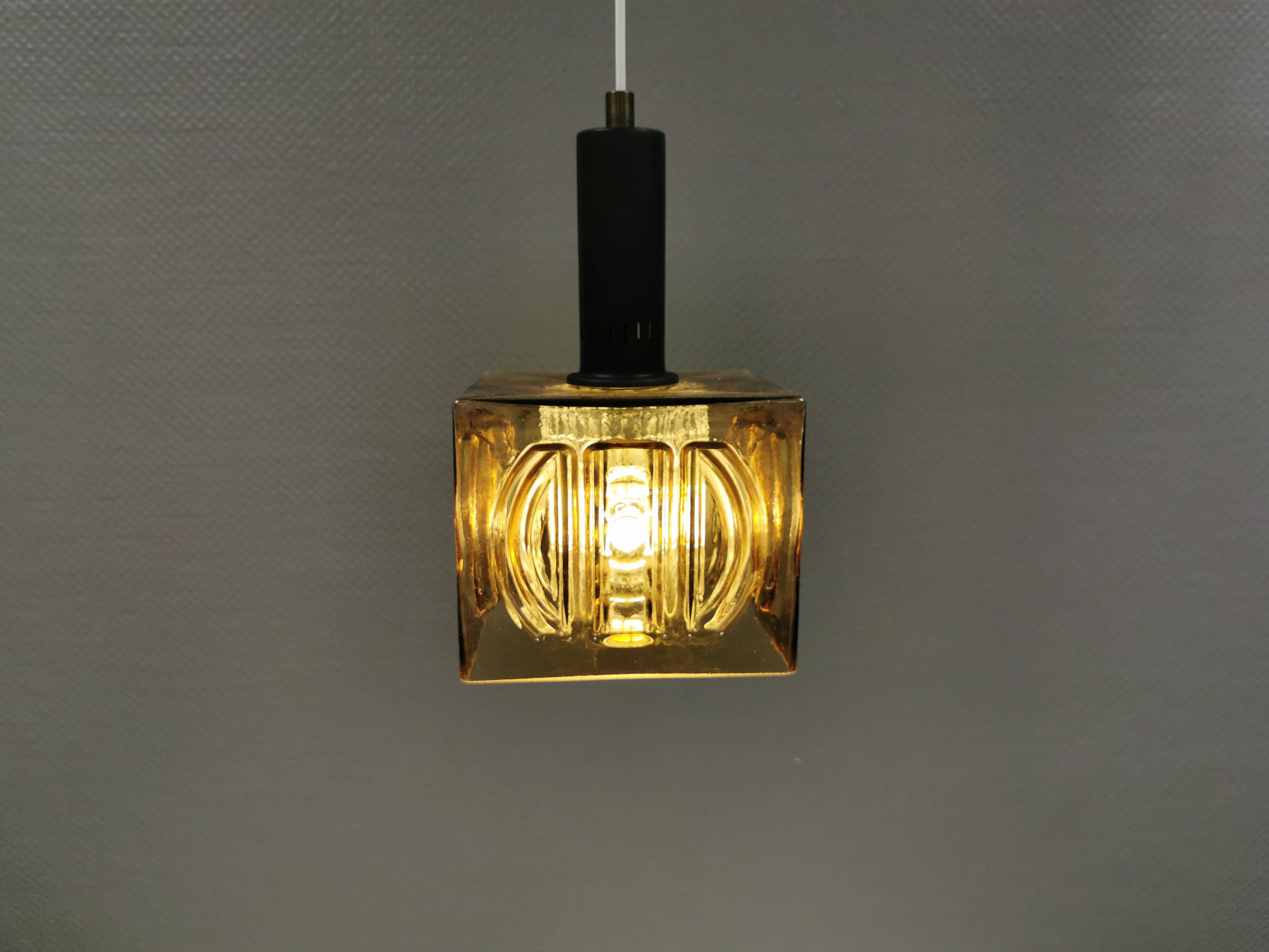 Older square hanging lamp with olive colored outer glass with inner shade of crystal glass