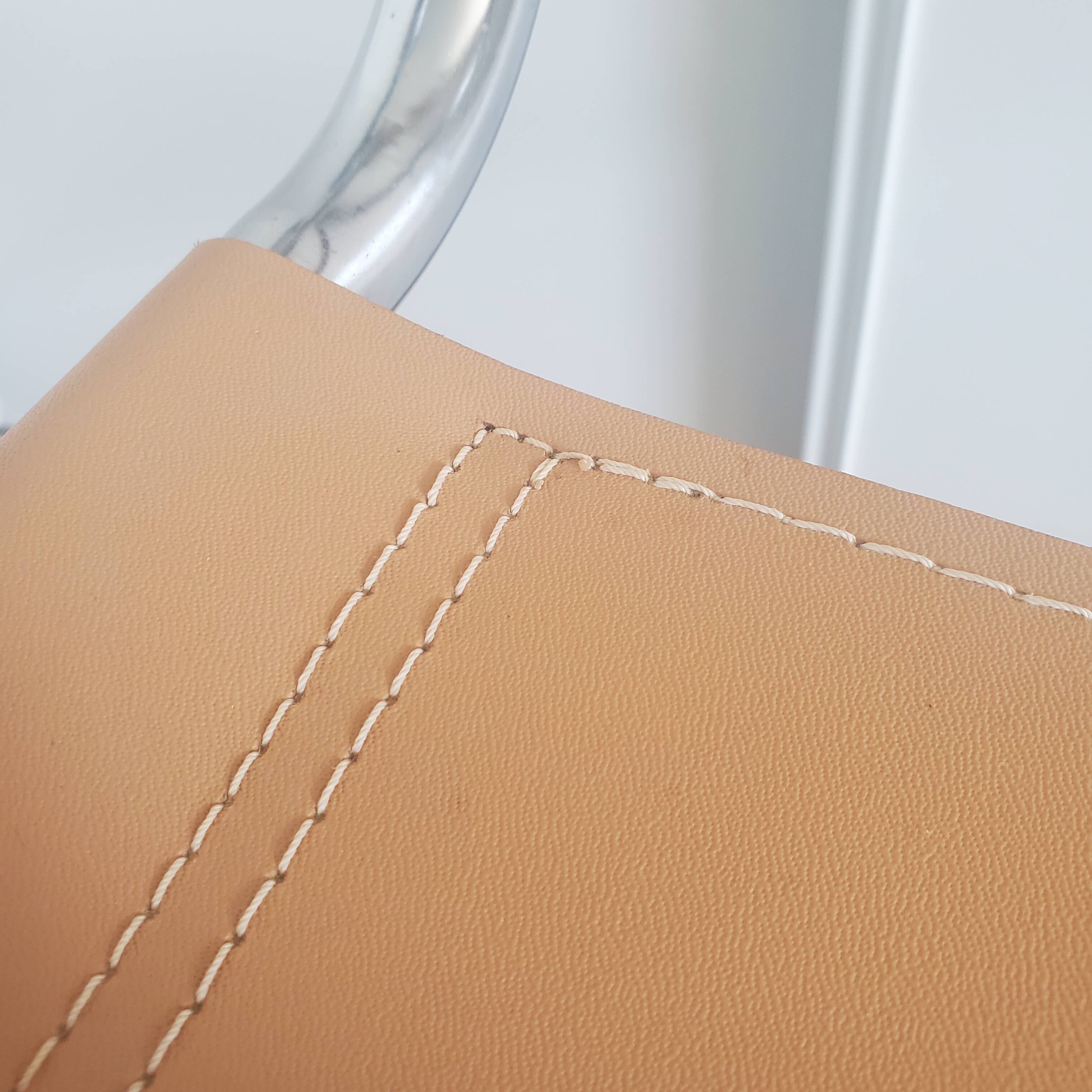 Beige leather armchair