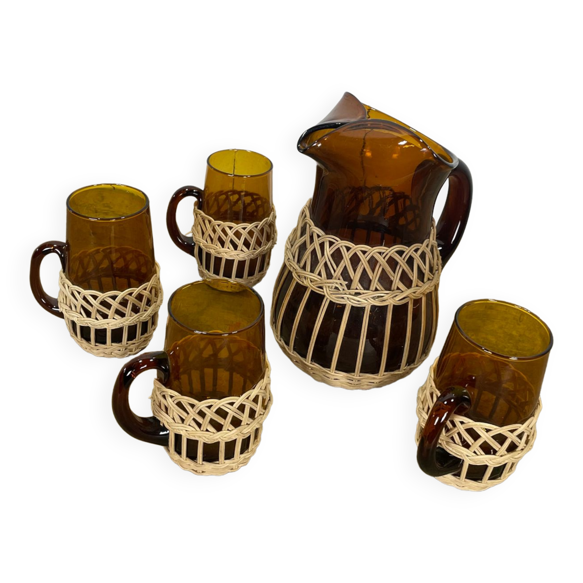 Carafe and glasses in amber glass and rattan